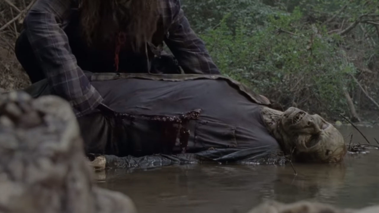 The Walking Dead | Por que Gamma estava jogando as entranhas de zumbis em um rio?